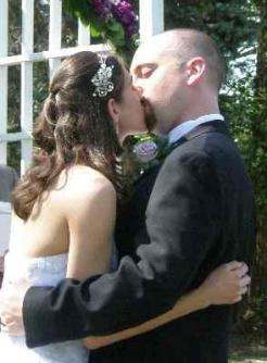 "You May Kiss the Bride" ~ You could "hear" the smiles all around those in attendance.